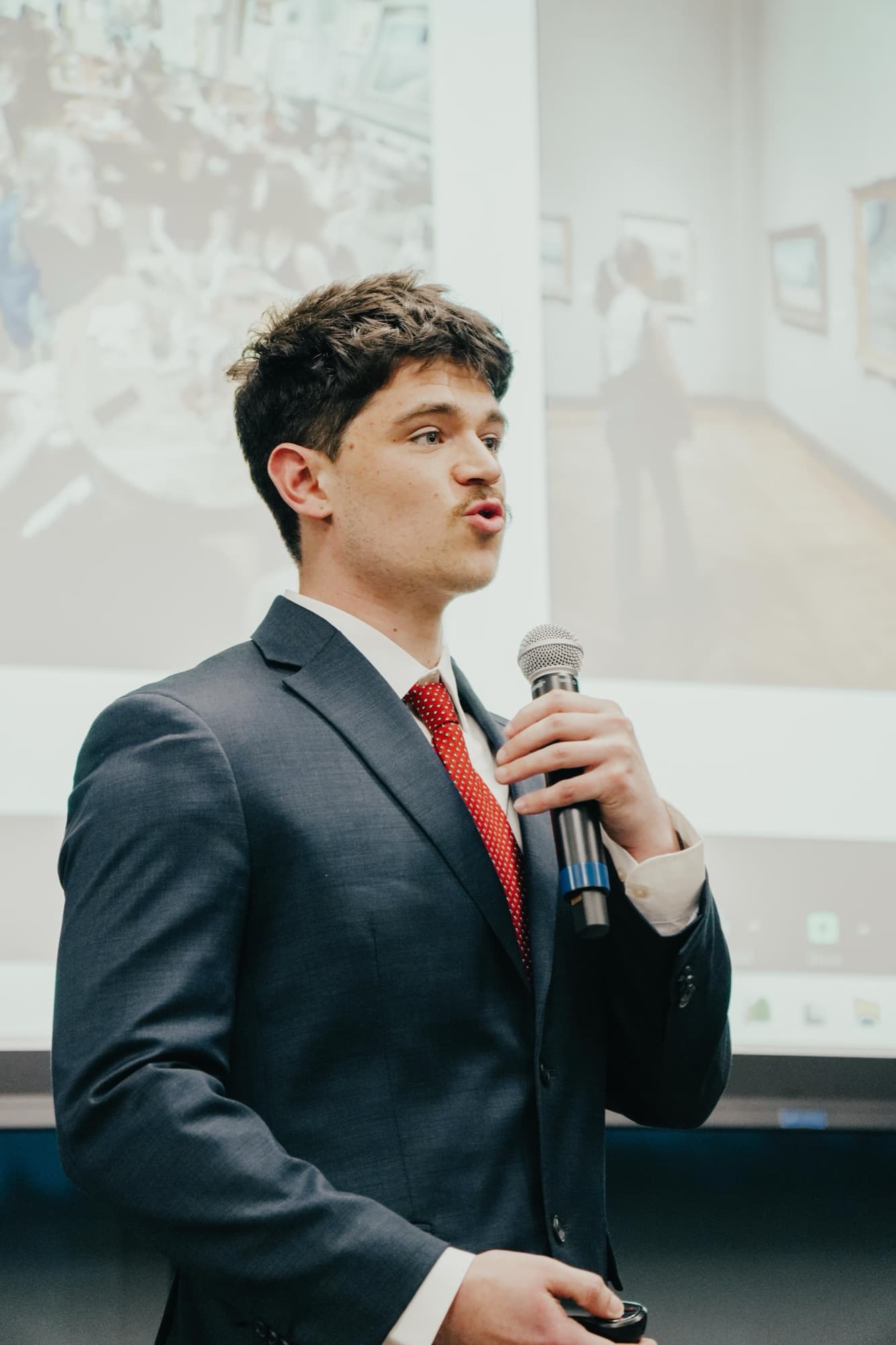 Judson Dunne pitching Locava on stage at the Big Idea Pitch Competition