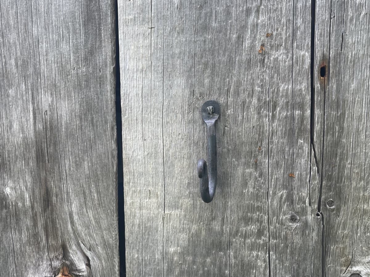 A hand-forged hook with a spade end